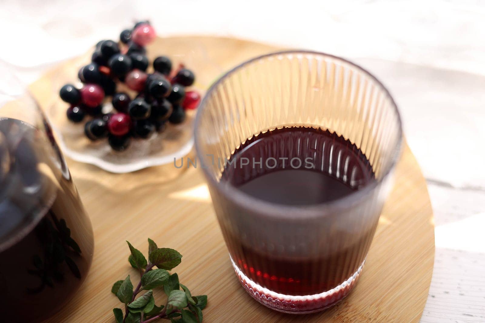 Grape juice poured into a stylish glass
