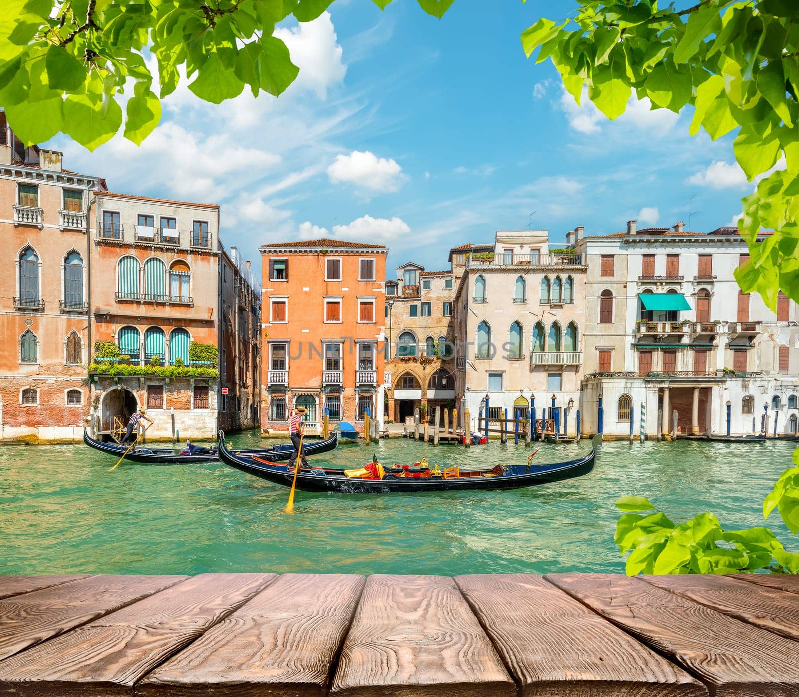 Canal in Venice between the old houses