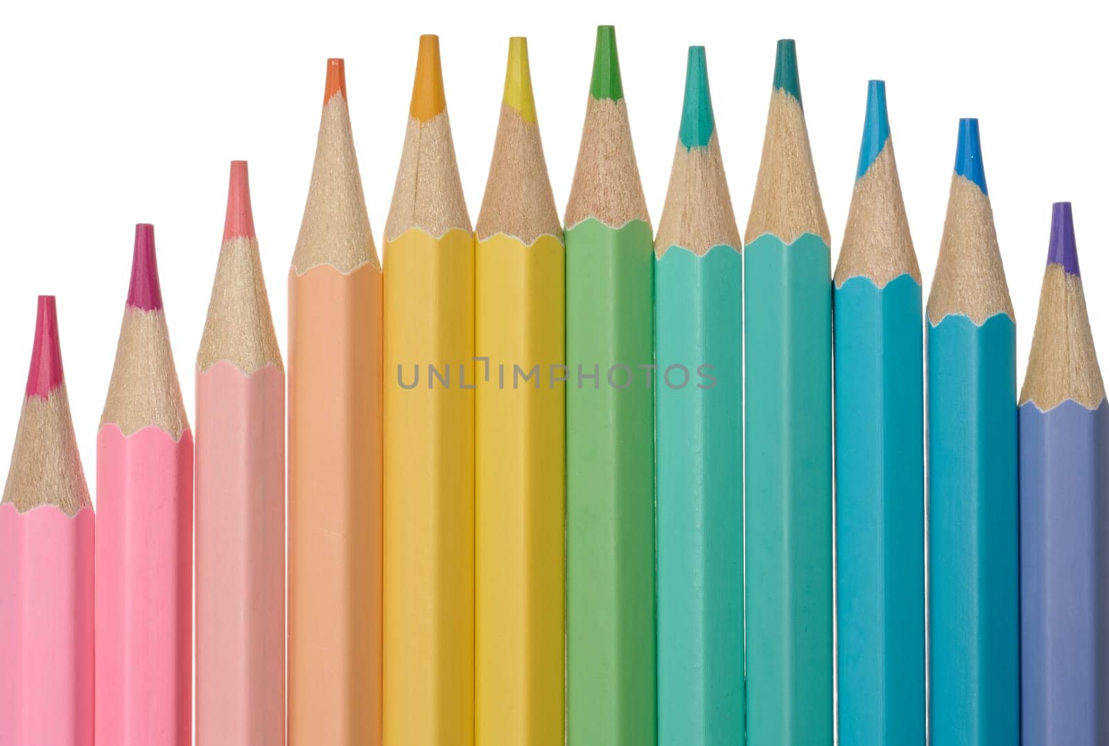 Multi-colored wooden pencils on a white background