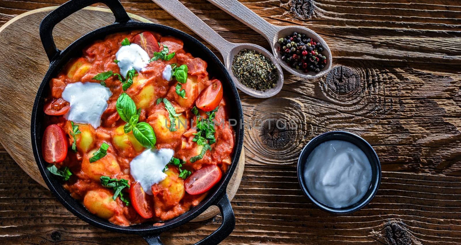 Creamy tomato gnocchi with burrata, basil and garlic.