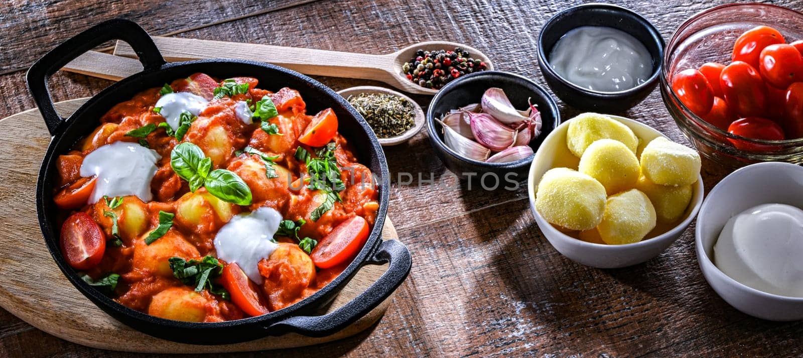 Creamy tomato gnocchi with burrata, basil and garlic.