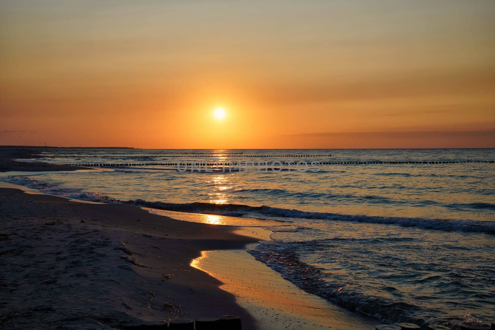 Sunset on the Baltic Sea coast near Zingst, Fischland-Darß, Mecklenburg-Western Pomerania, Germany