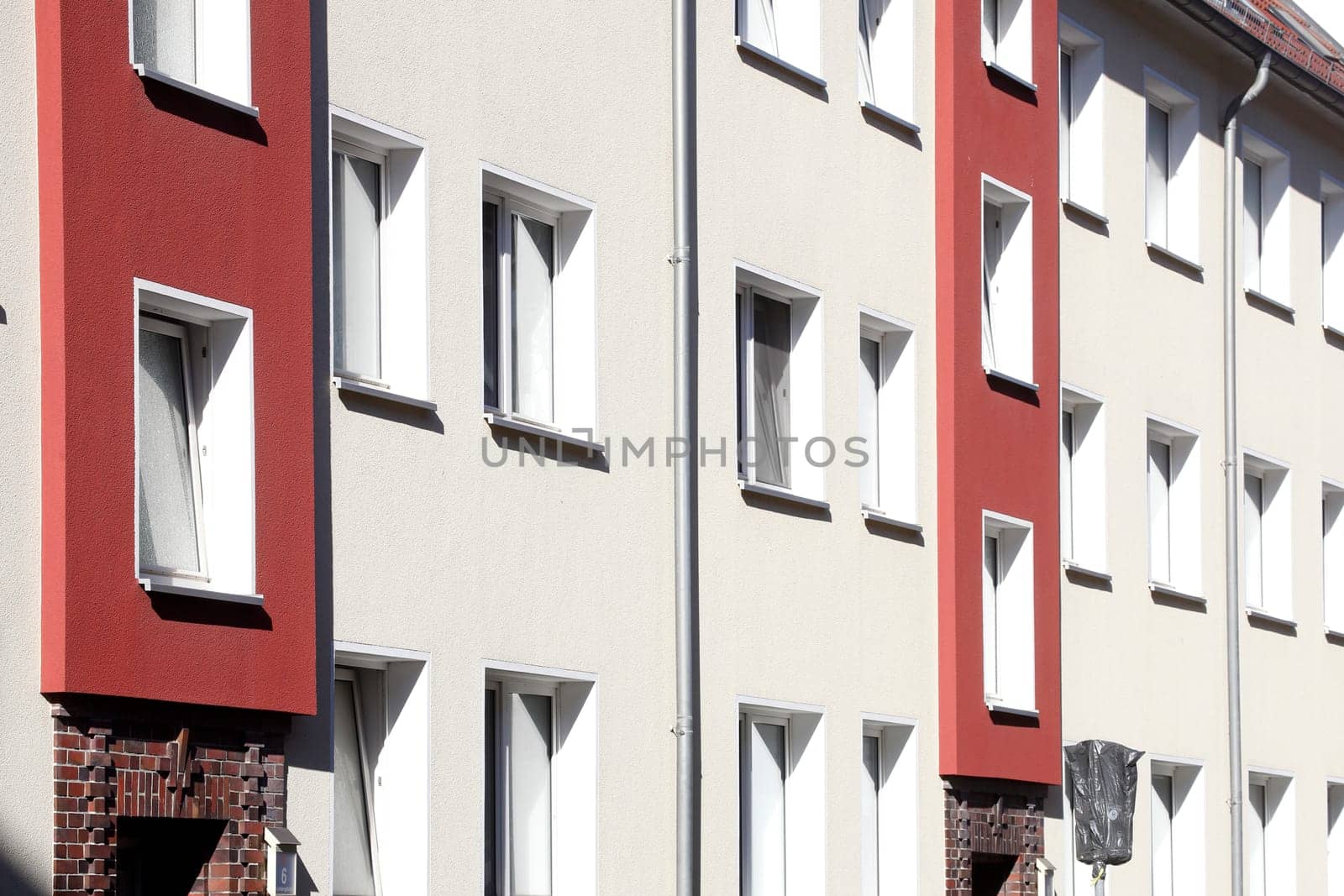 Window front, modern, red and white residential building, Findorff, Bremen, Germany