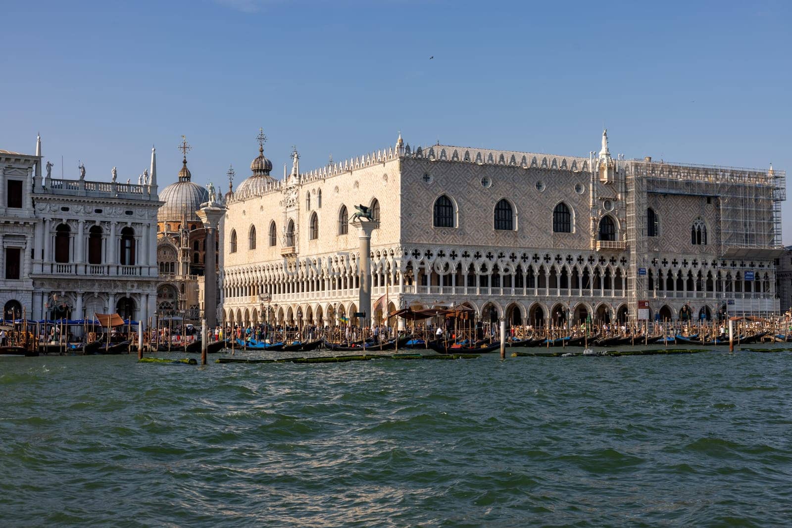 Venice, Italy - September 6, 2022: The Doge's Palace and Piazzetta San Marco seen from Bacino di San Marco. Venice, Italy