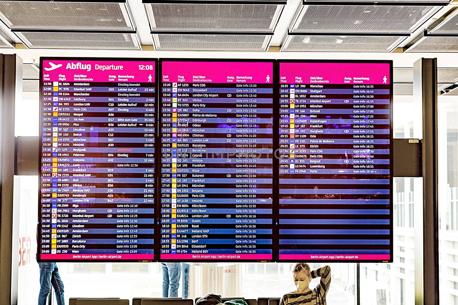 Berlin, Germany - February 7, 2022: departure board with actual information about gate and departing flight.