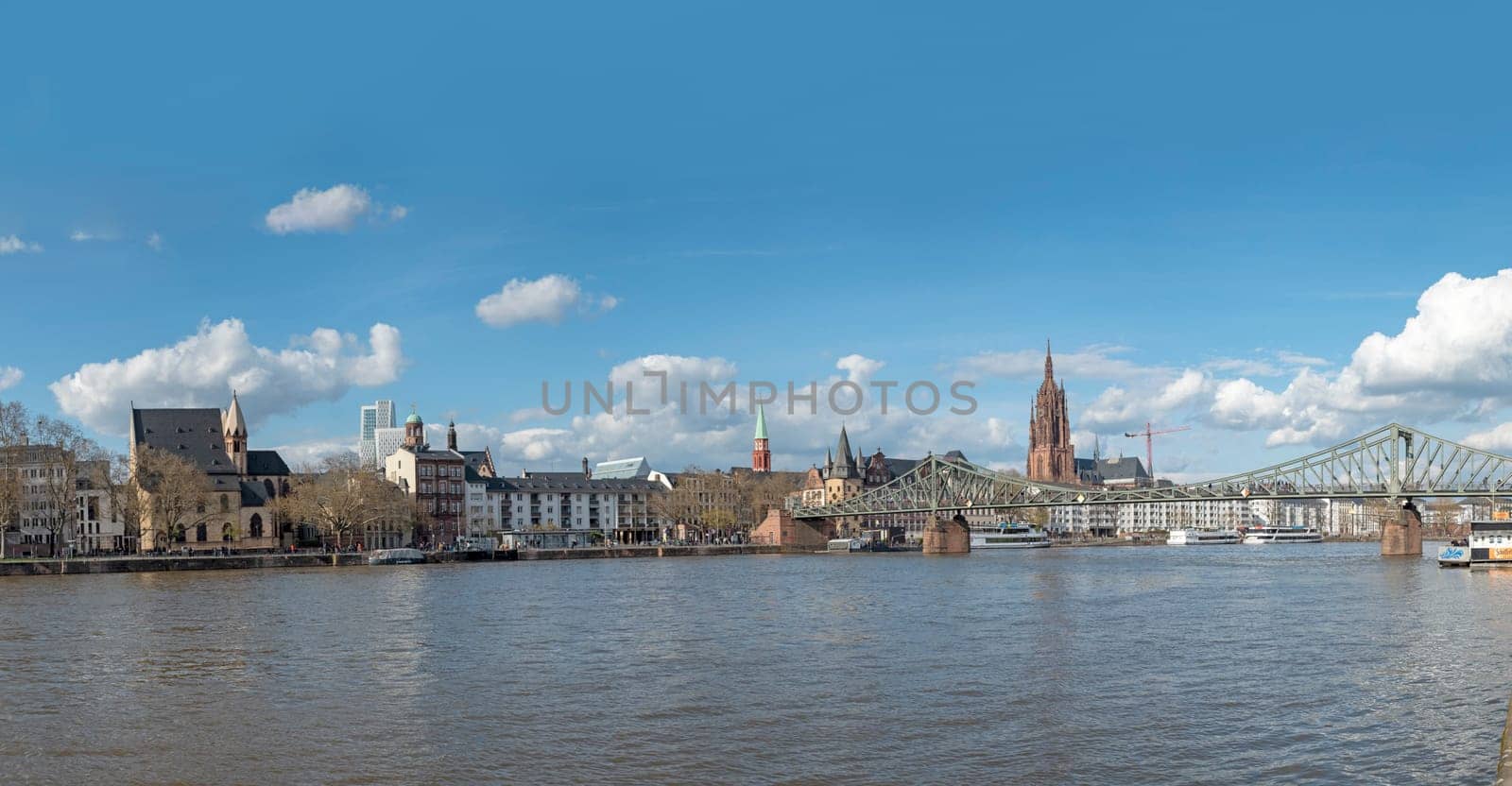 Frankfurt, Germany - April 10, 2022: view from Sachsenhausen to downtown Frankfurt overlooking river Main, Germany.