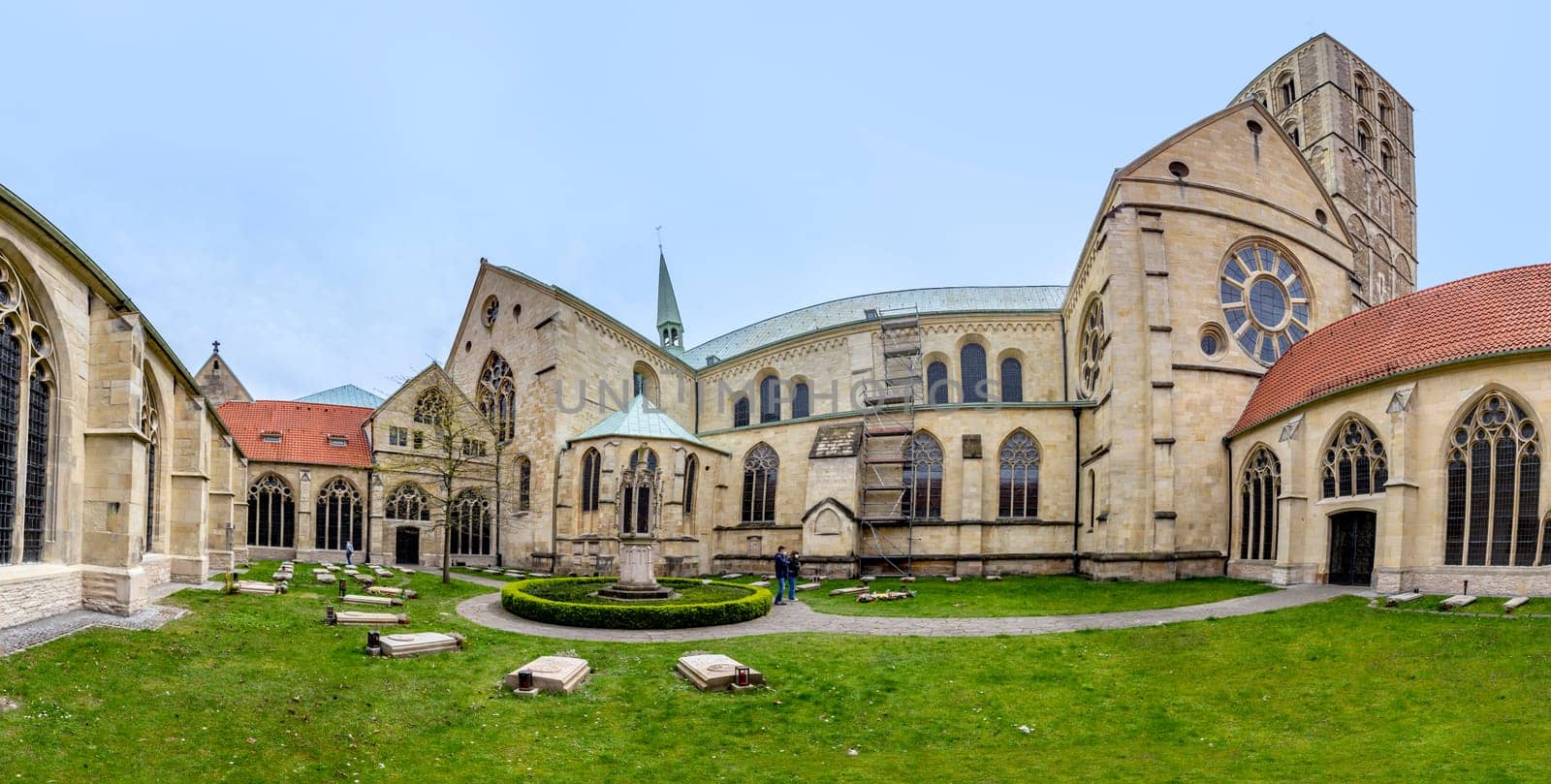 Münster, Germany - April 29, 2022: cemetery of the catholic cathedral in Muenster with graves of priests,bishop and other clerical people.