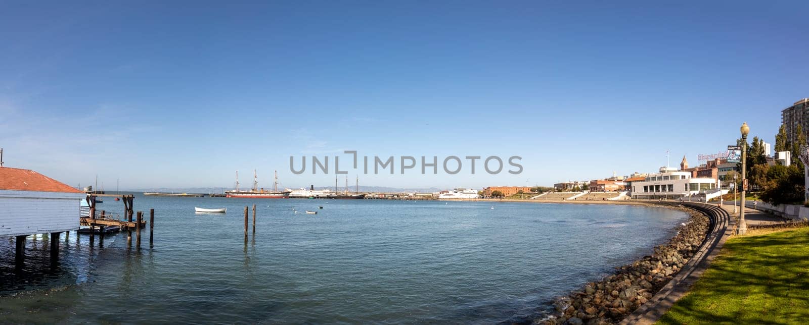 San Francisco, USA - May 18, 2022: view to famous white modern Maritime Museum at the bay of San Francisco in early morning light.