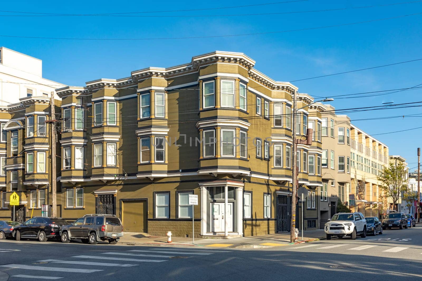 San Francisco, USA - May 18, 2022:  old houses in downtown San Francisco in bright light.