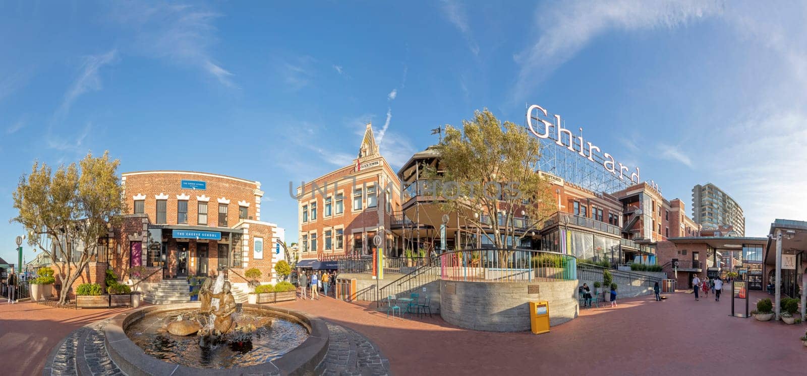 San Francisco, USA - June 6, 2022:  view to famous Ghirardelli  shop and chocolate factory at the bay of San Francisco in early morning light.