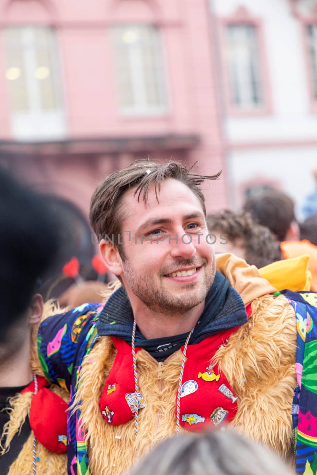 Mainz, Germany - February 16, 2023: people celebrate the Weiberfastnacht - engl womans carnival - in Mainz at the schiller square in Germany.