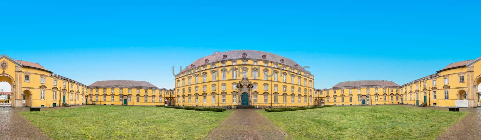 Osnabrueck, Germany - February 18, 2023: panoramic view to scenic castle in Osnabrueck, Germany under blue sky.