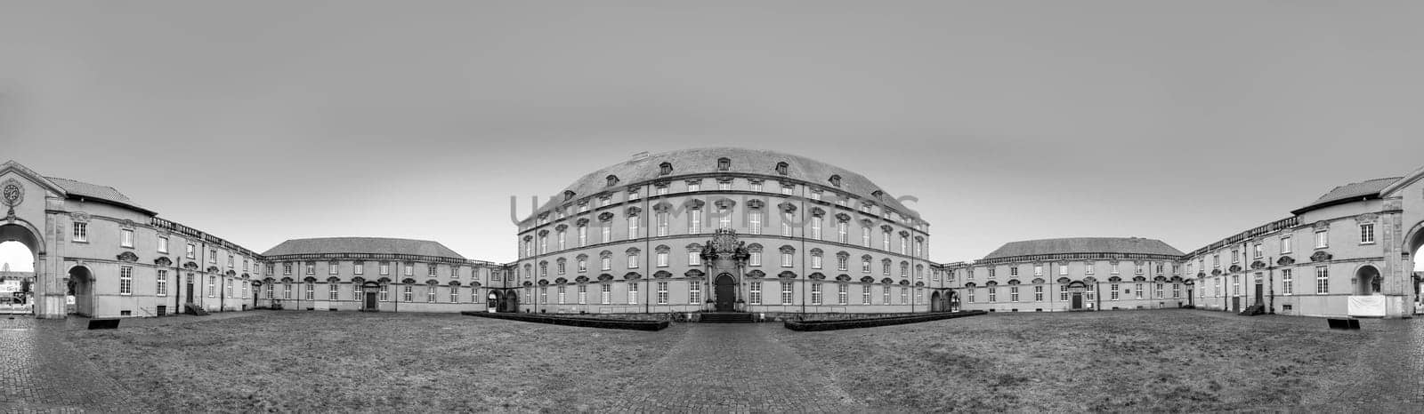 Osnabrueck, Germany - February 18, 2023: panoramic view to scenic castle in Osnabrueck, Germany in black and white.