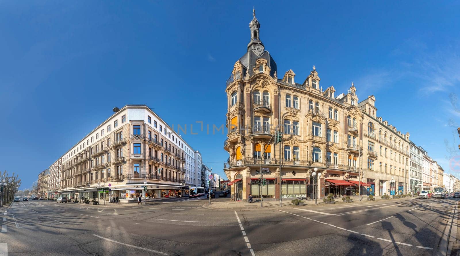 Wiesbaden, Germany - February 21, 2023: view to historic buildings at Wilhelmstrasse - engl: wilhelm street in Wiesdaden. Wilhelm street is the classicistical shopping street in Wiesbaden.