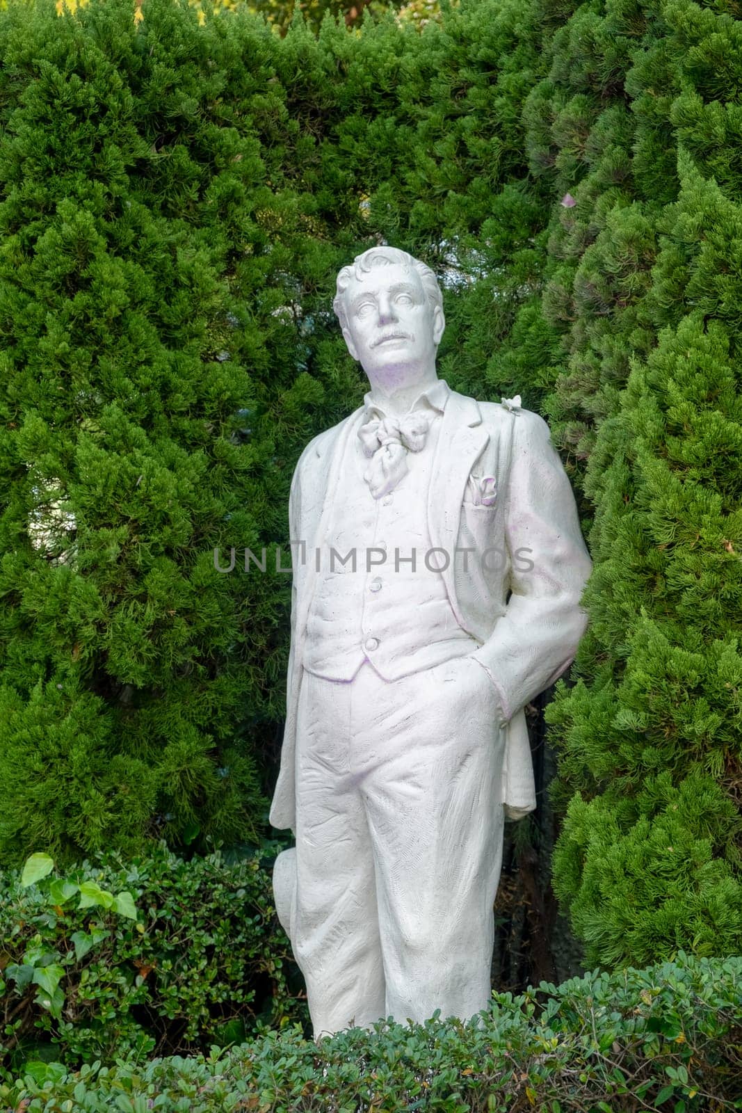 Nagasaki,  Japan - April 1, 2023: Statue in glover Garden of composer Giacomo Puccini, famous for opera Madame Butterfly in Nagasaki. Created by sculptor Gilbert Lebigre in 1996.