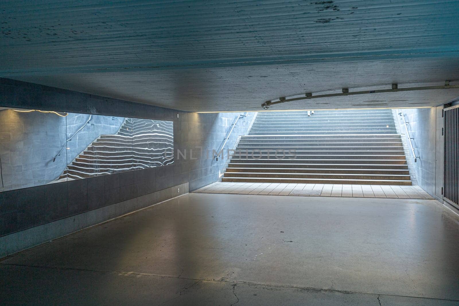pedestrian subway in a germany city Wiesbaden with blue light from advertising