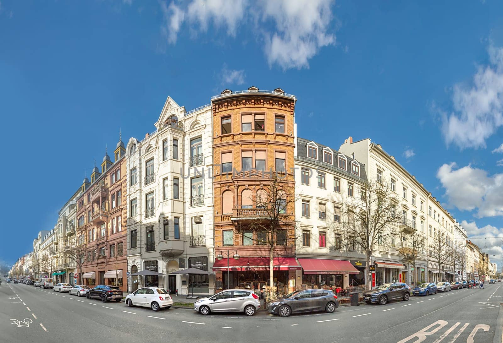 Wiesbaden, Germany - March 25, 2023: view to historic Taunusstrasse - engl Taunus street in Wiesbaden. The houses are all built in the 19th century and all are well restored.