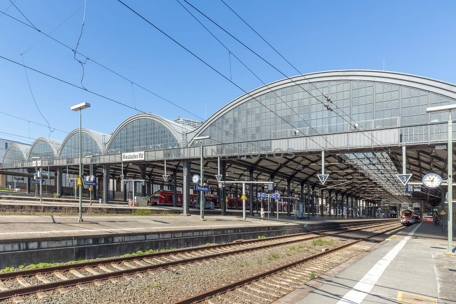 Wiesbaden, Germany - April 4, 2023:  view to the neoclassical train station in Wiesbaden, the smaller copy of Frankfurt Train station.