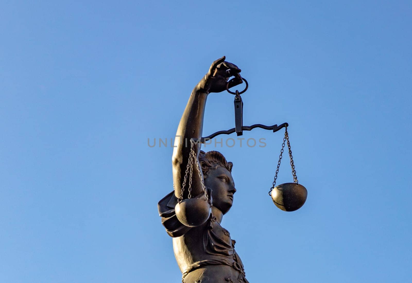 Frankfurt, Germany - February 28, 2023: Statue of Lady Justice (Justitia) in Frankfurt, Germany.