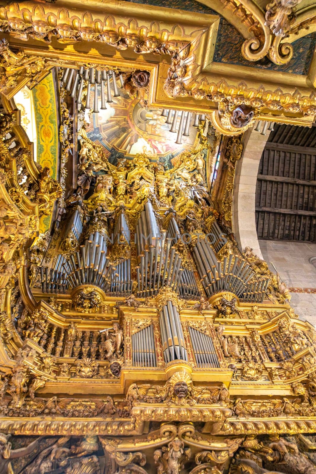 Braga, Portugal - May 1, 2023: High Choir Golden Decoration and Organs at Sé de Braga Cathedral Interior - Braga, Portugal