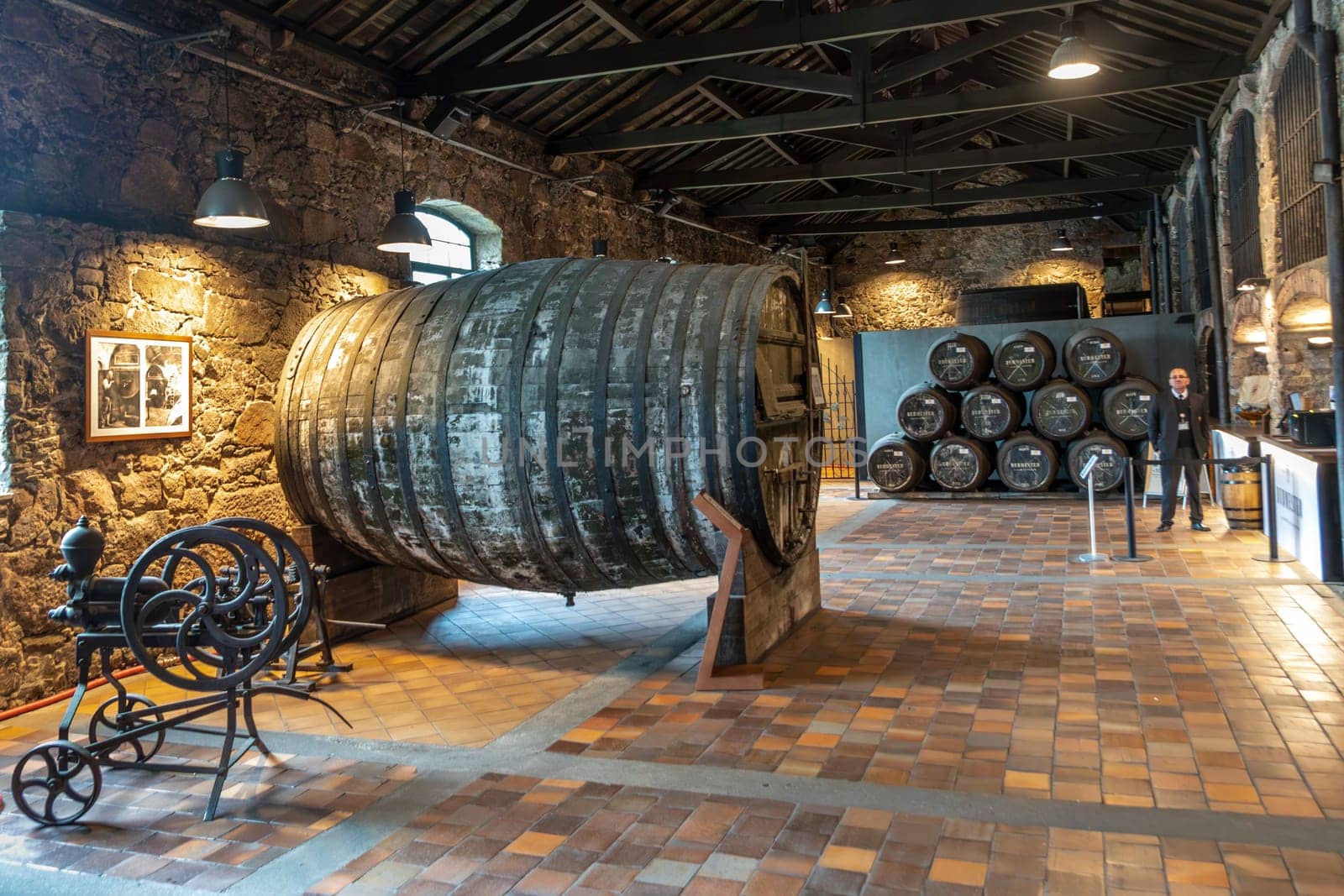 Porto, Portugal - May 3, 2023: old port wine barrel in the Burmester vinery in Gaia, Porto, Portugal.