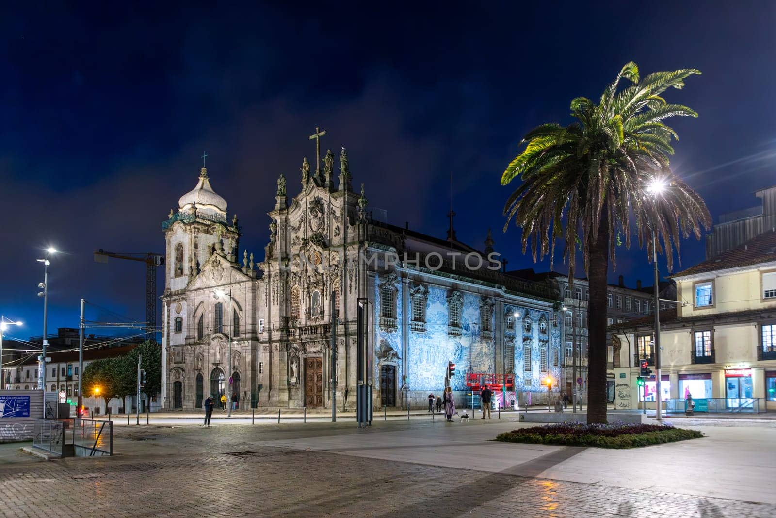 Porto, Portugal - May 4, 2023: Fountain and the baroque Igreja do Carmo, Church of the Song, in Porto.