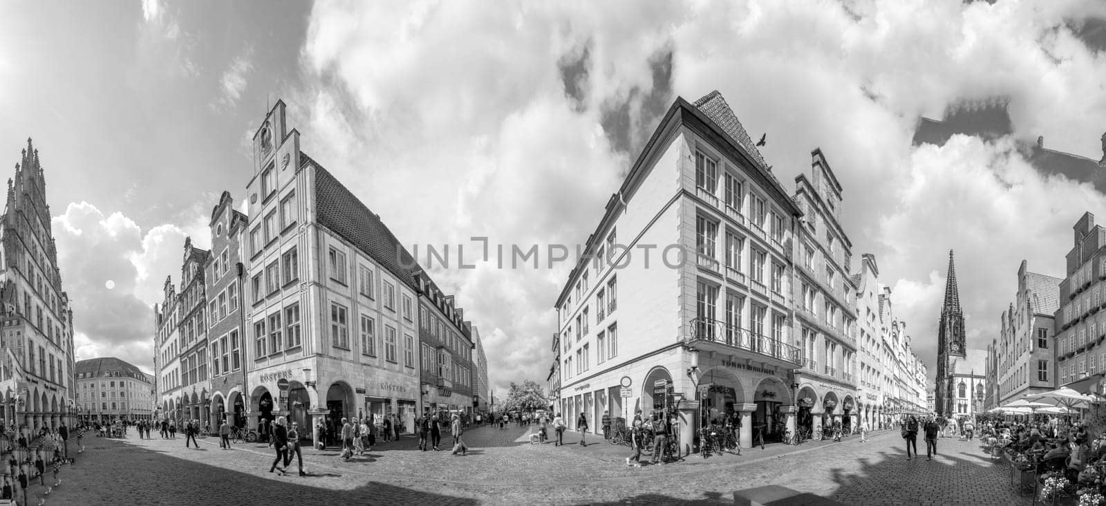 Muenster, Germany - August 5, 2023: people visit the historiv prinzipalmarkt at the town of Muenster, Germany.