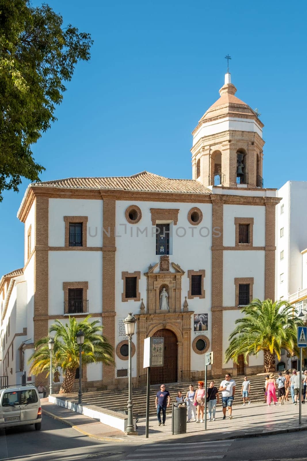 Ronda, Spain - September 25, 2023: people visit church nuestra senora del socorro in Ronda, Spain