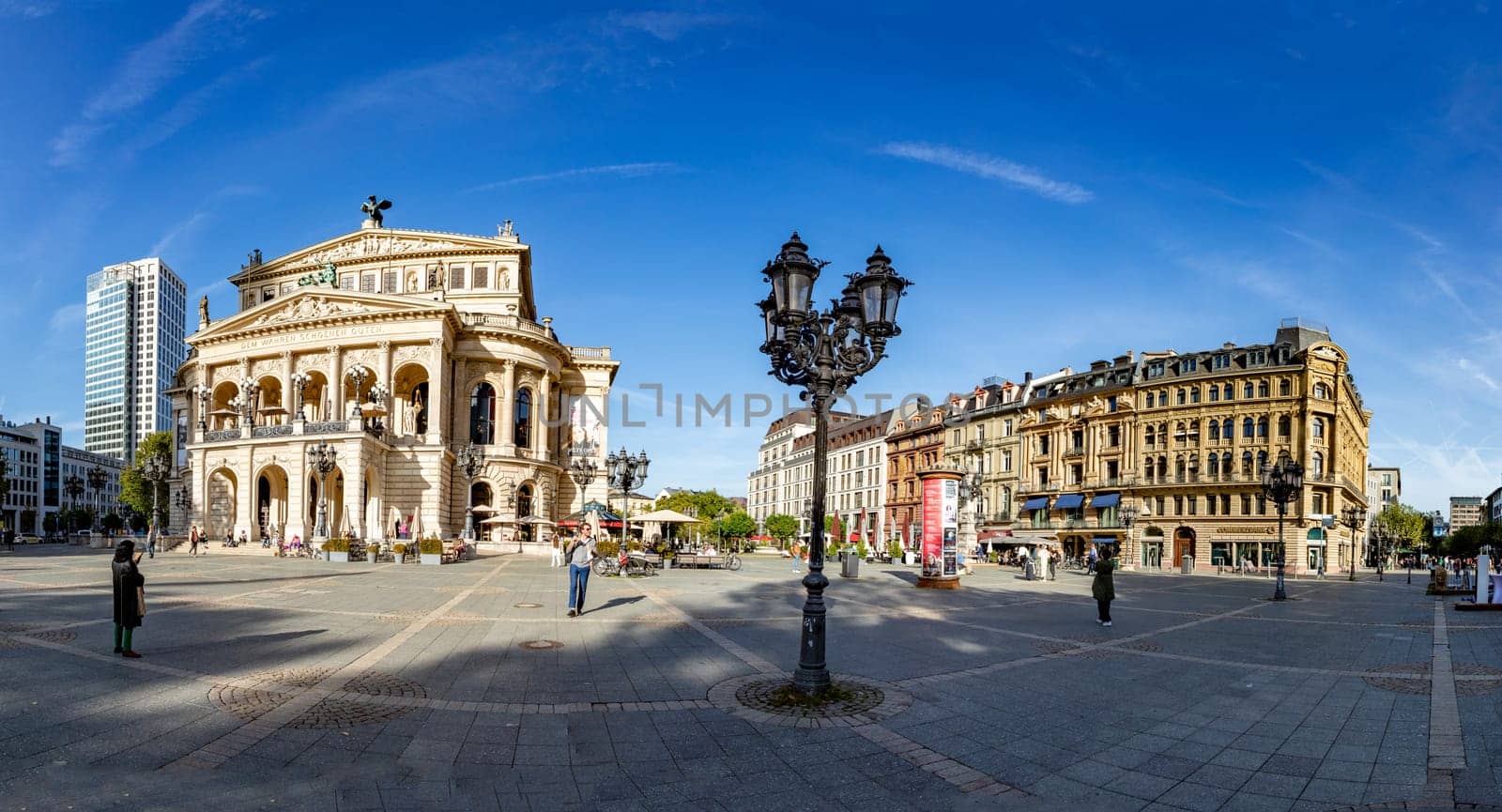 Frankfurt, Germany - October 10, 2023: view of old opera house and fountain with other historic houses at the Zeil in Frankfurt, Germany