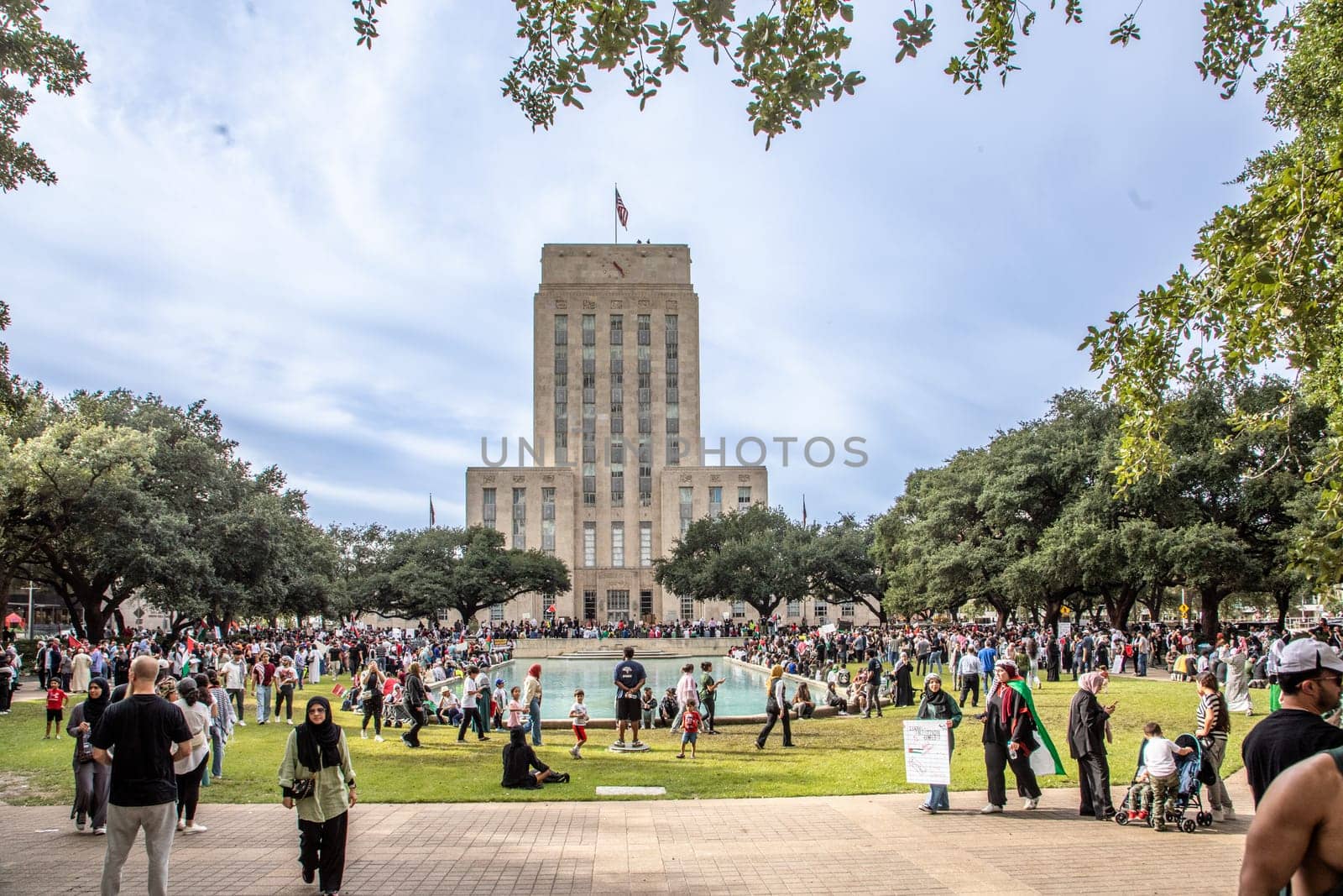 Houston, USA - October 21, 2023: people demonstrate for peace in palestine at the city hall of Houston.
