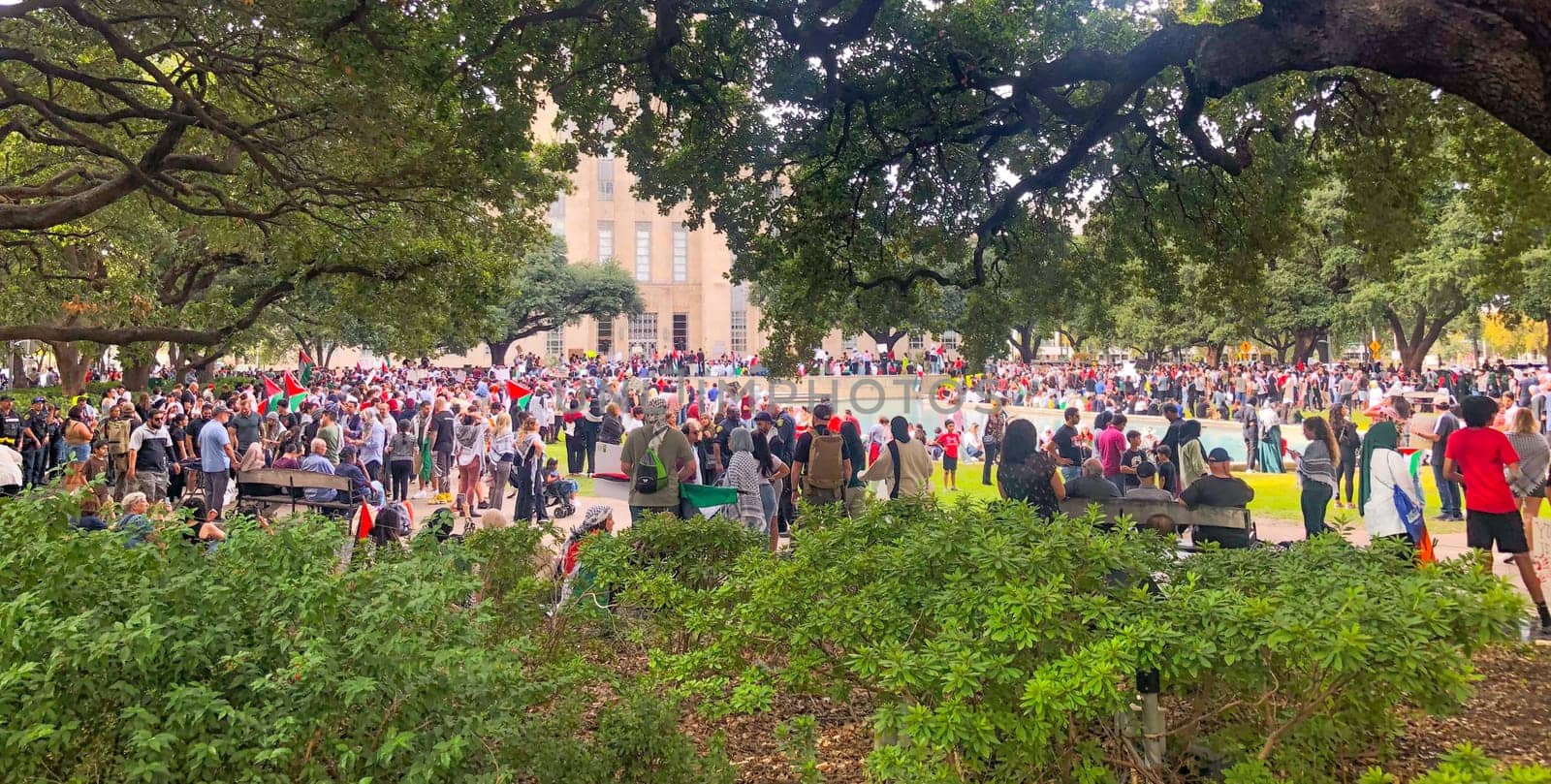 Houston, USA - October 21, 2023: people demonstrate for peace in palestine at the city hall of Houston.
