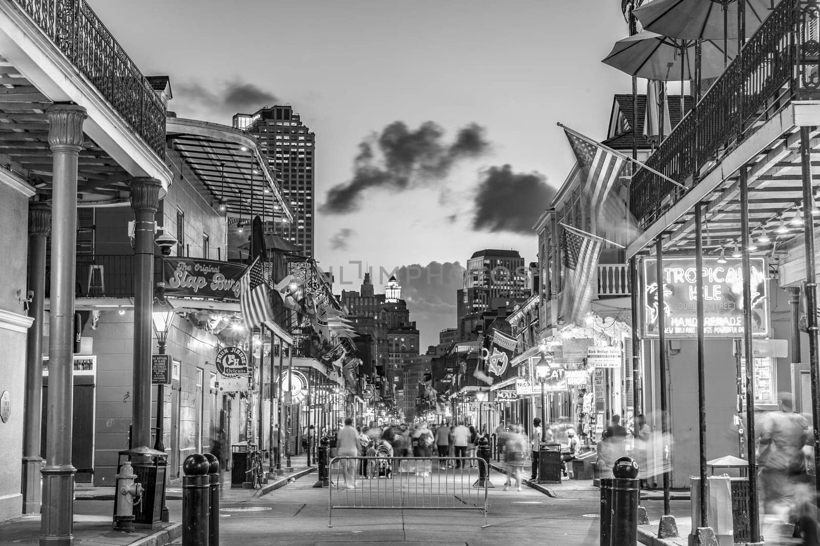 New Orleans, USA - October 24, 2023: Pubs and bars with neon lights in the French Quarter, downtown New Orleans.