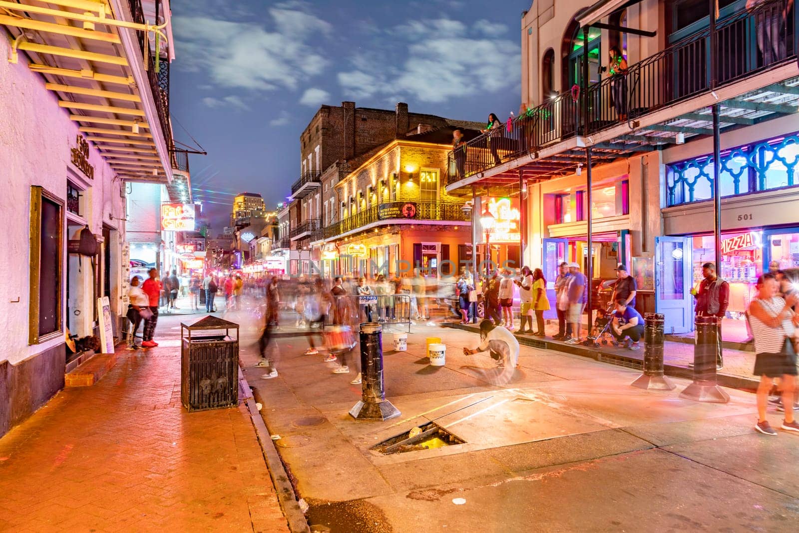 New Orleans, USA - October 24, 2023: Pubs and bars with neon lights in the French Quarter, downtown New Orleans.