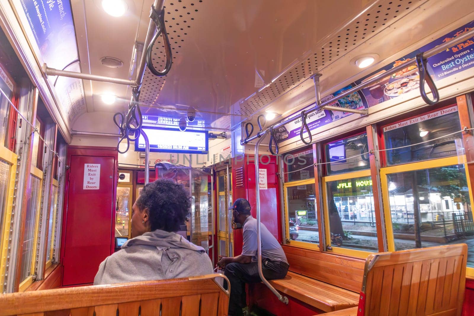 New Orleans  USA - October 25, 2023: people in New Orleans use the street car in early morning to go to town and work.
