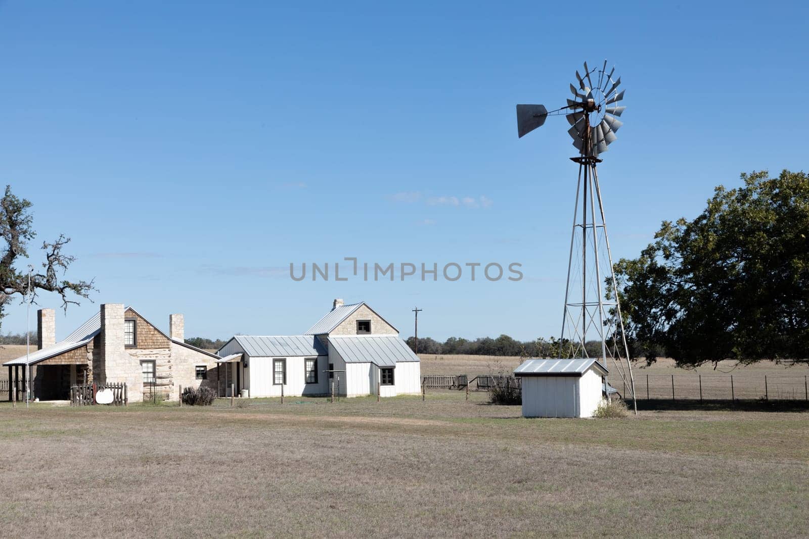 Fredericksburg, USA - November 2, 2023: The Main Street in Frederiksburg, Texas, also known as The Magic Mile, with retail stores and people walking.