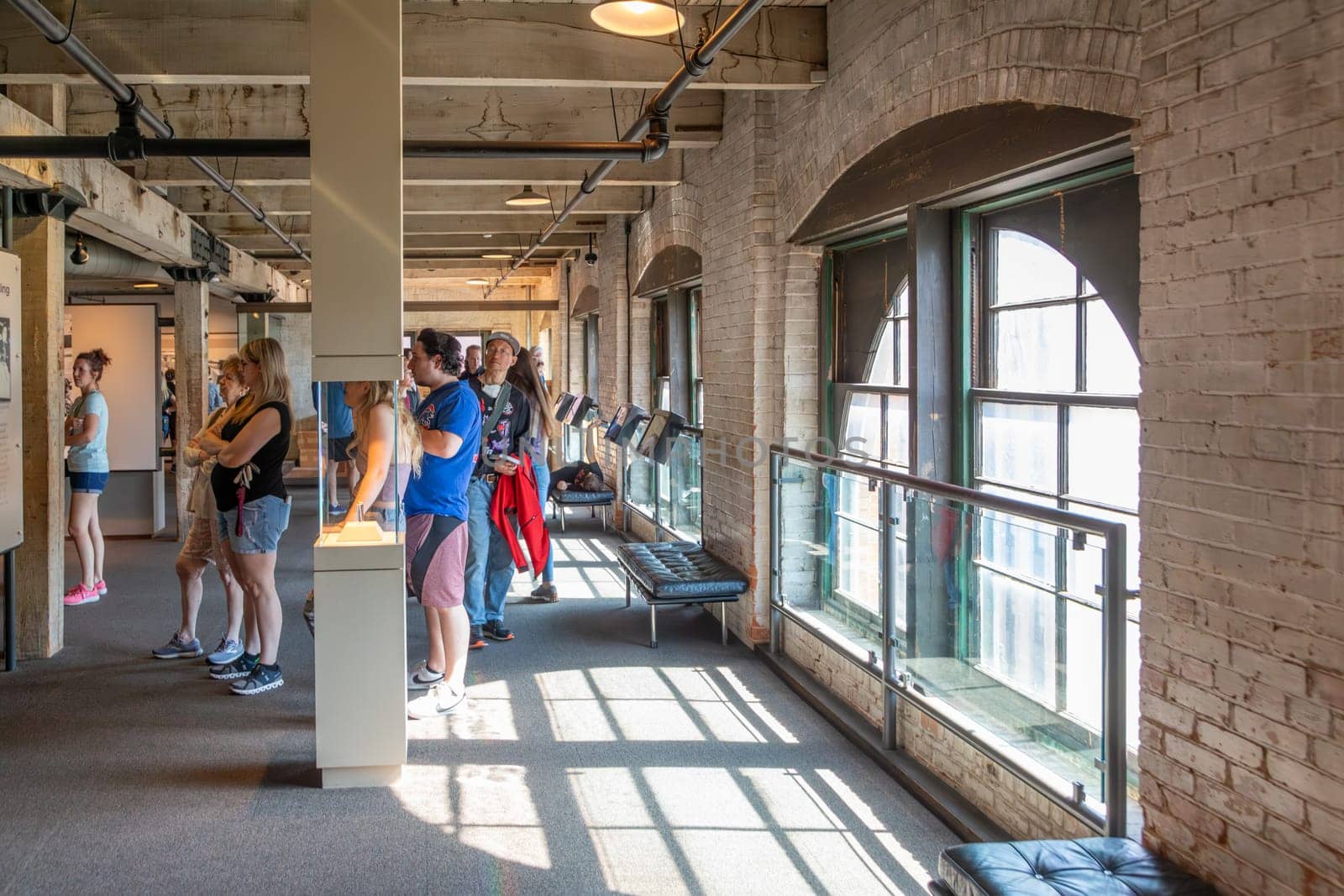 Dallas, USA - November 7, 2023: people visit  the Sixth Floor Museum at Dealey Plaza in the former Texas School Book Depository in Dallas, Texas. John F. Kennedy was murdered by Oswald in 1963.