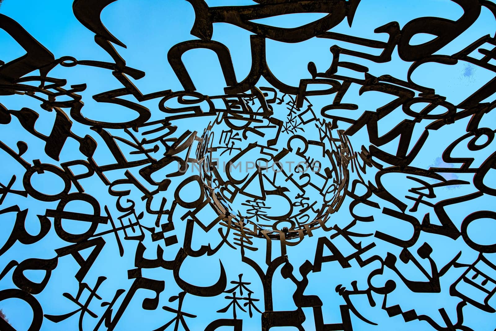 Frankfurt, Germany - January 7, 2024: detail of sculpture Body of Knowledge from Jaume Plensa in Frankfurt, Germany. The sculpture was donated by Johanna Quandt and inaugurated in 2010.