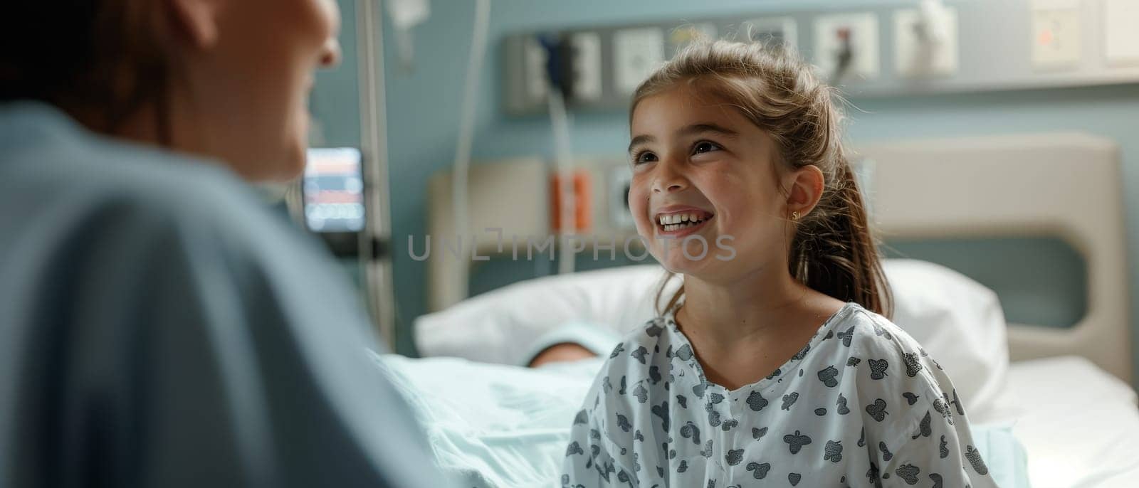 A young girl, wide-eyed and smiling, chats animatedly in a bright hospital ward, her joyful energy casting a warm glow