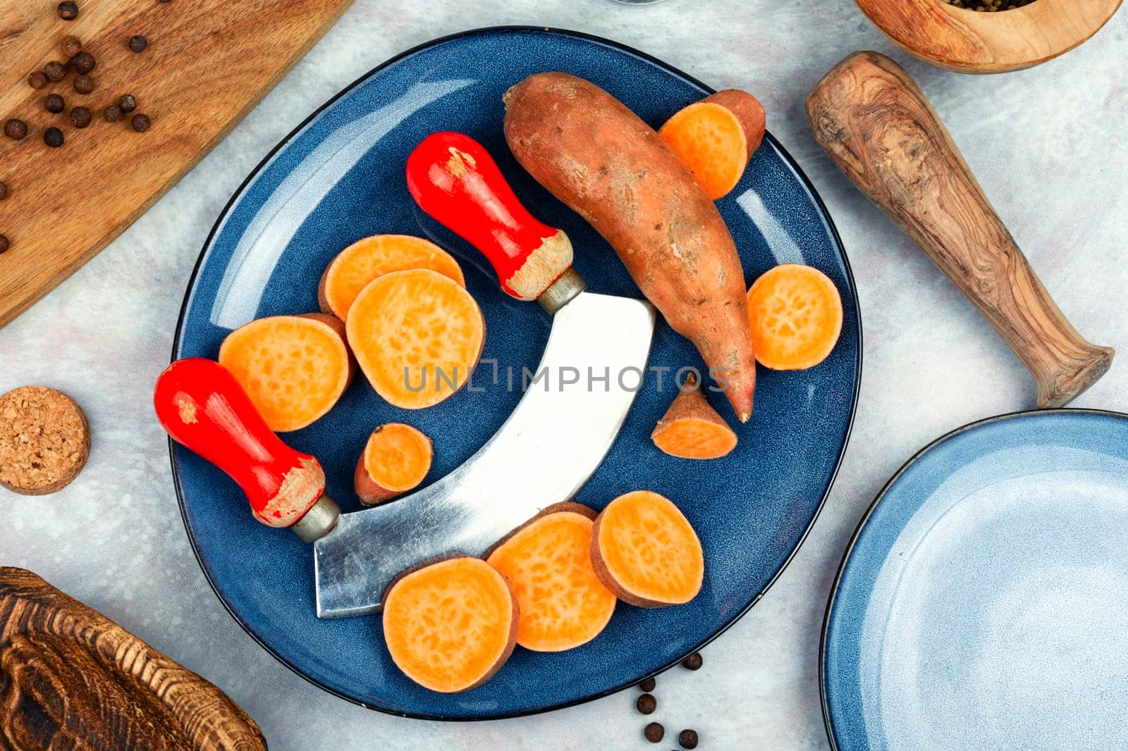 Sliced fresh sweet potatoes chunks for cooking. Orange kumara, yam. Healthy eating.
