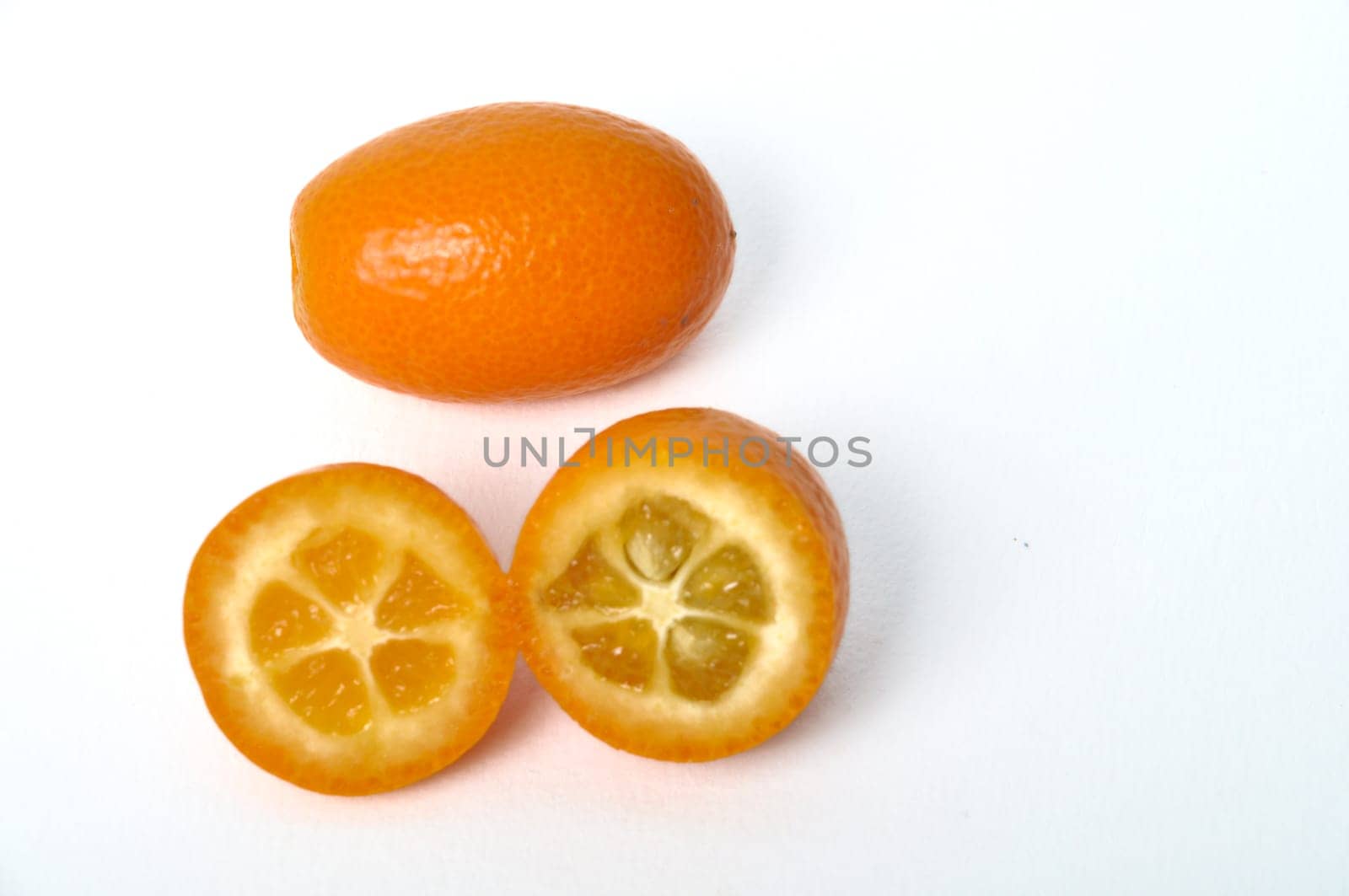 kumquat on a white background