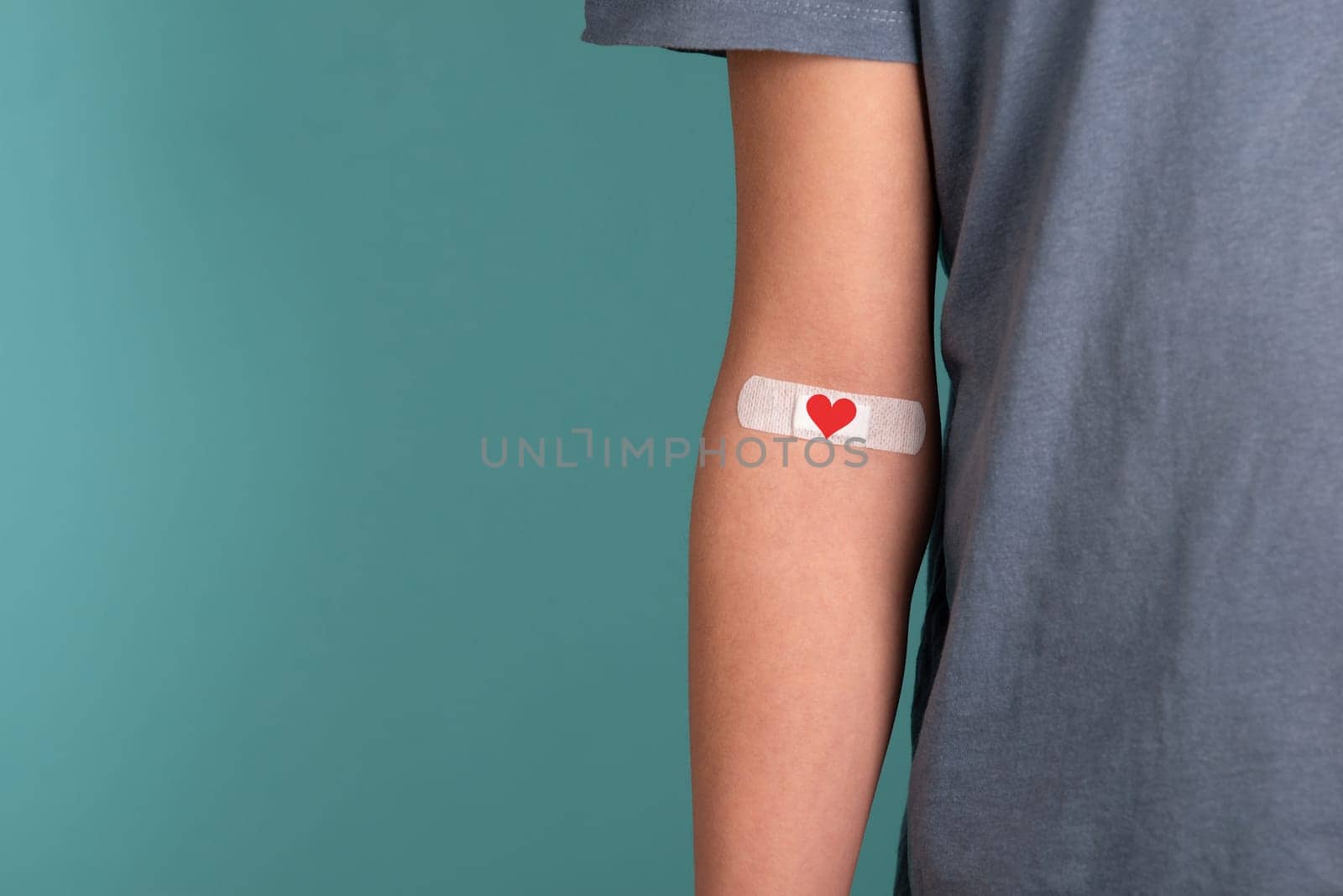 Arm with plaster and heart, blood cells, donate plasma, world blood donor day, health care, transfusion, Leukaemia disease