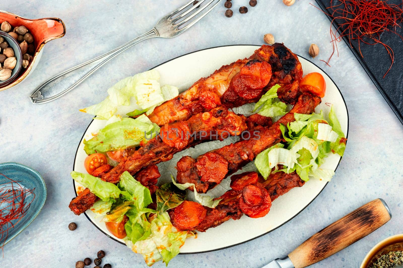 Braised pork ribs in tomato sauce. BBQ. Stew.