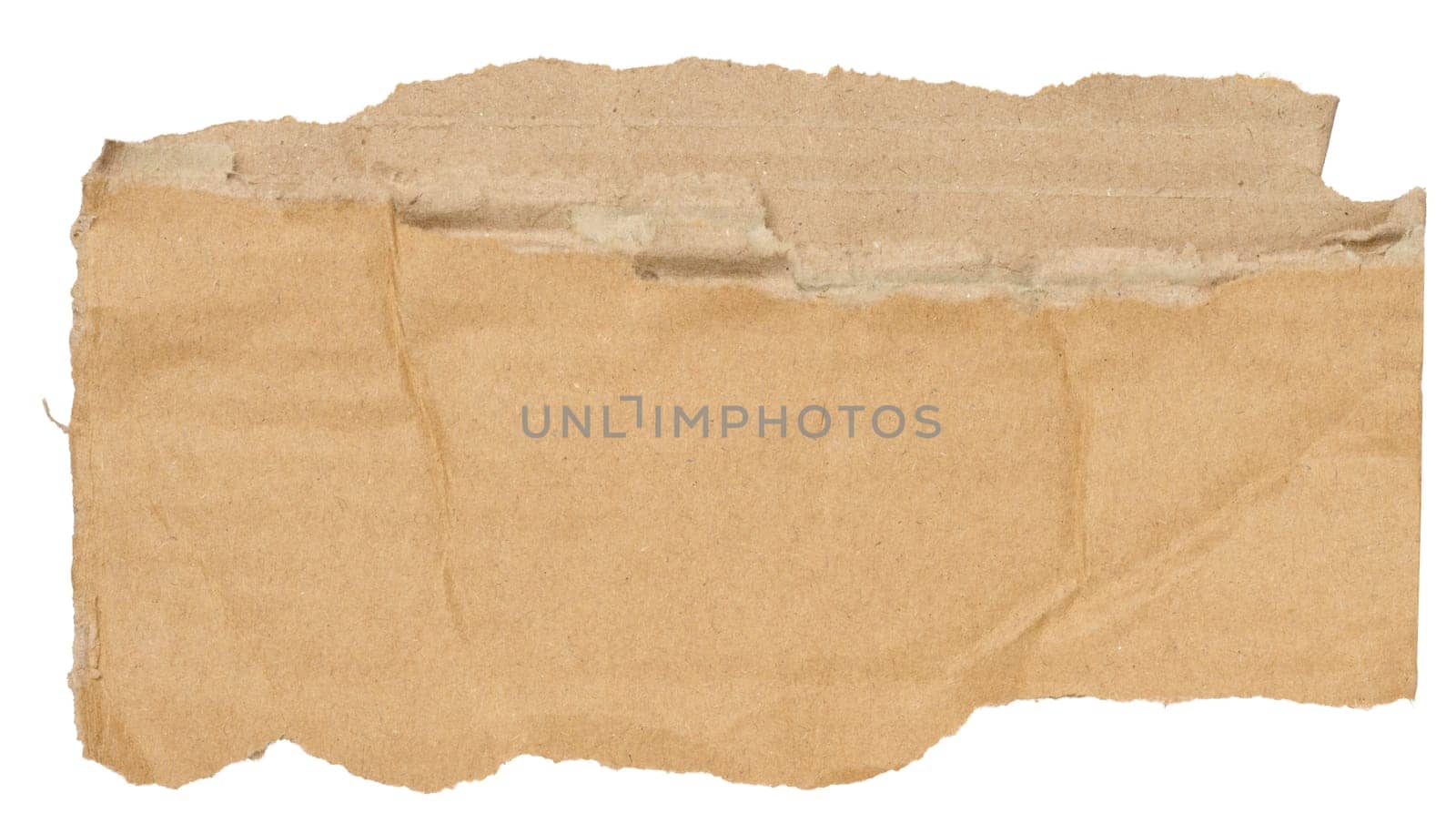 Piece of brown cardboard with torn edges on isolated background, close up