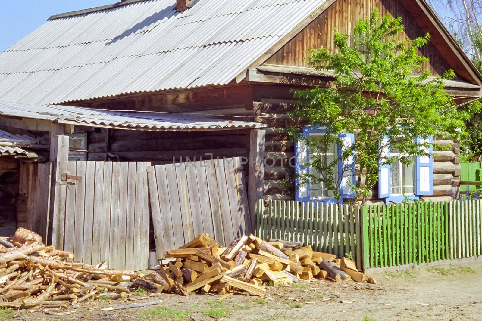 Old wooden buildings on the shores of Lake Baikal, Wooden house on the lake.