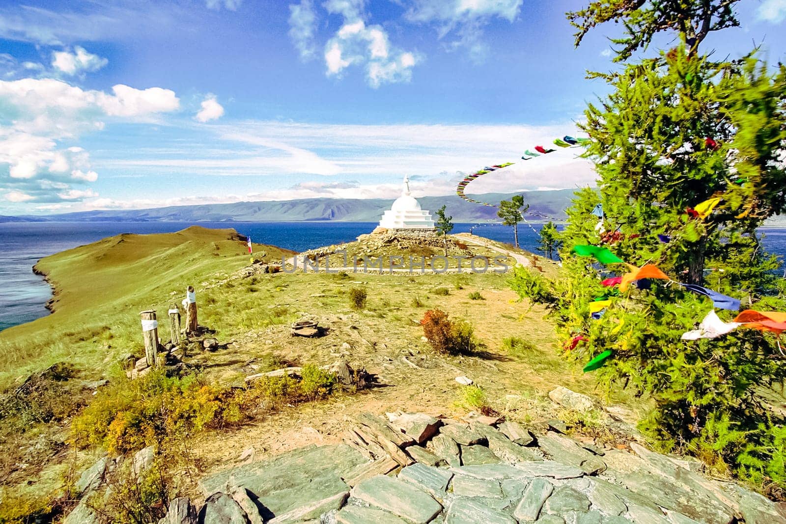 Colored ribbons on trees and pillars, superstition for good luck, Baikal traditions.