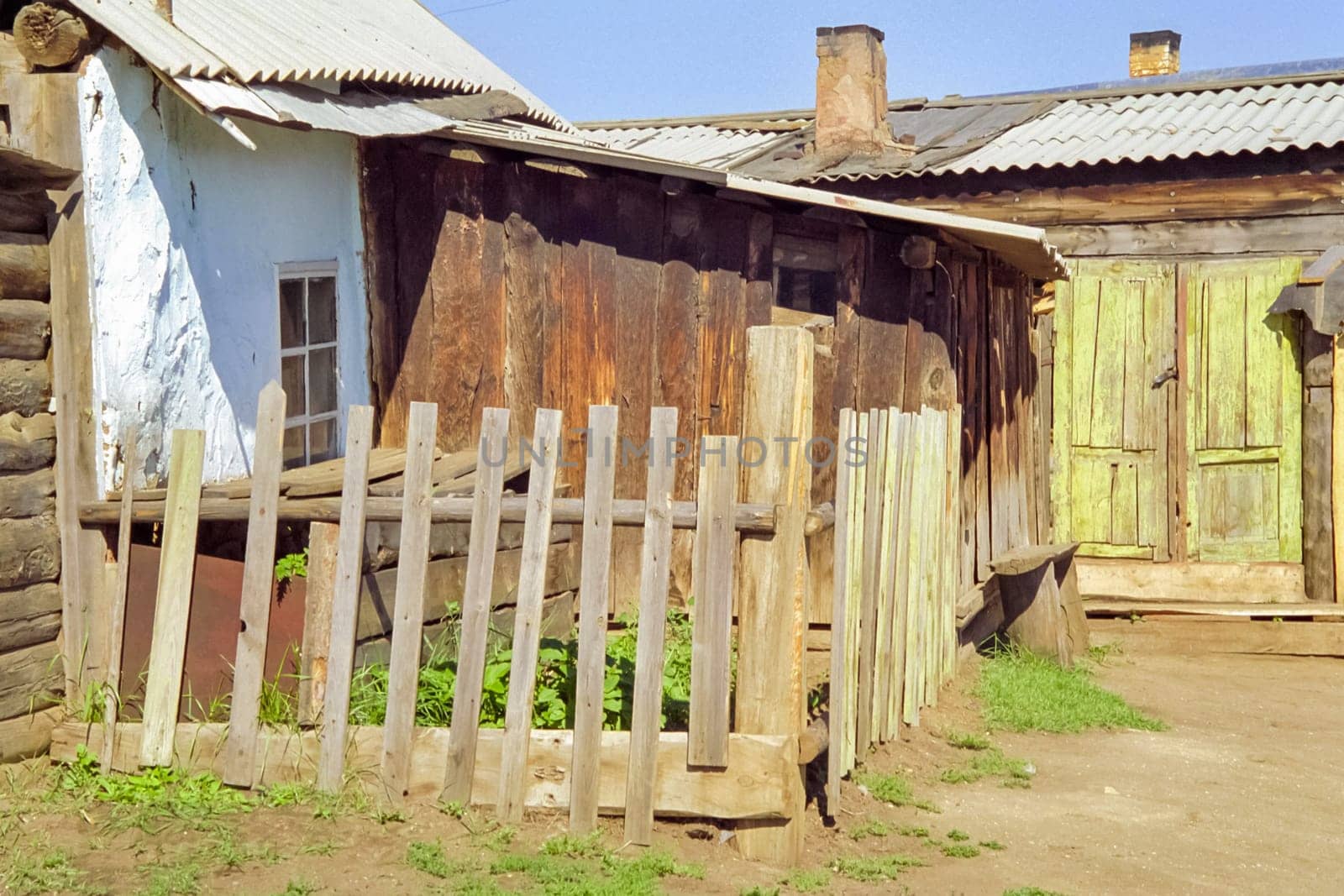 Old wooden buildings on the shores of Lake Baikal, Wooden house on the lake.