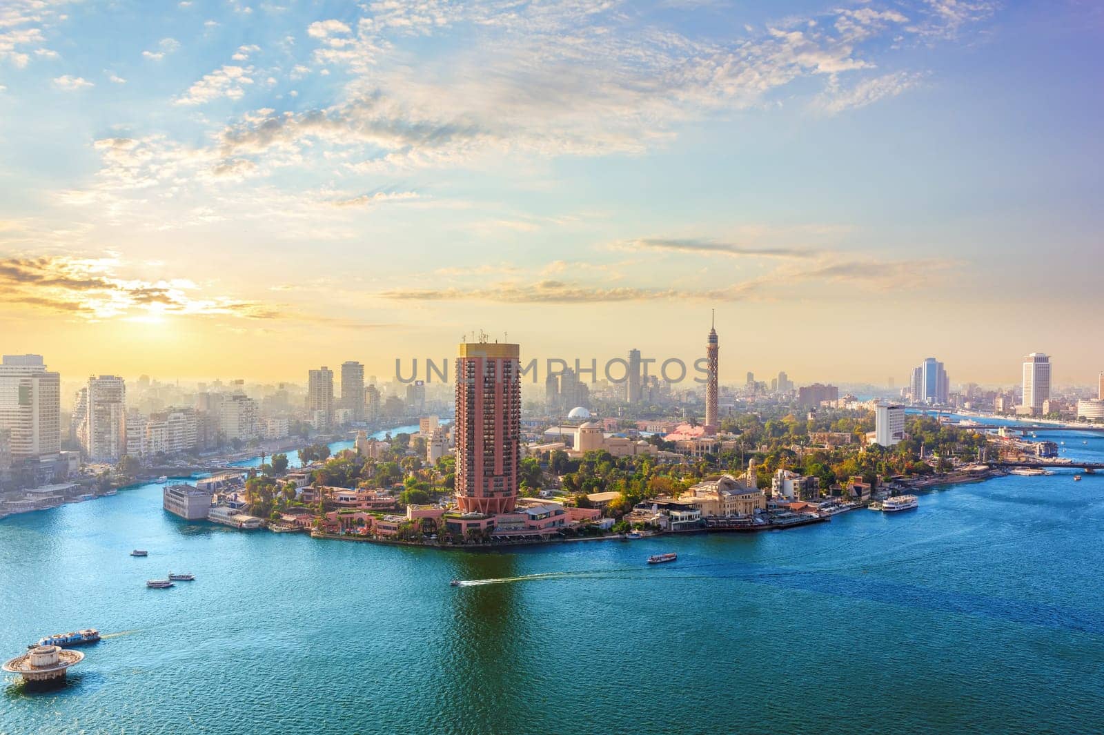 Gezira island in the Nile river at sunset, exclusive aerial view of Cairo, Egypt.