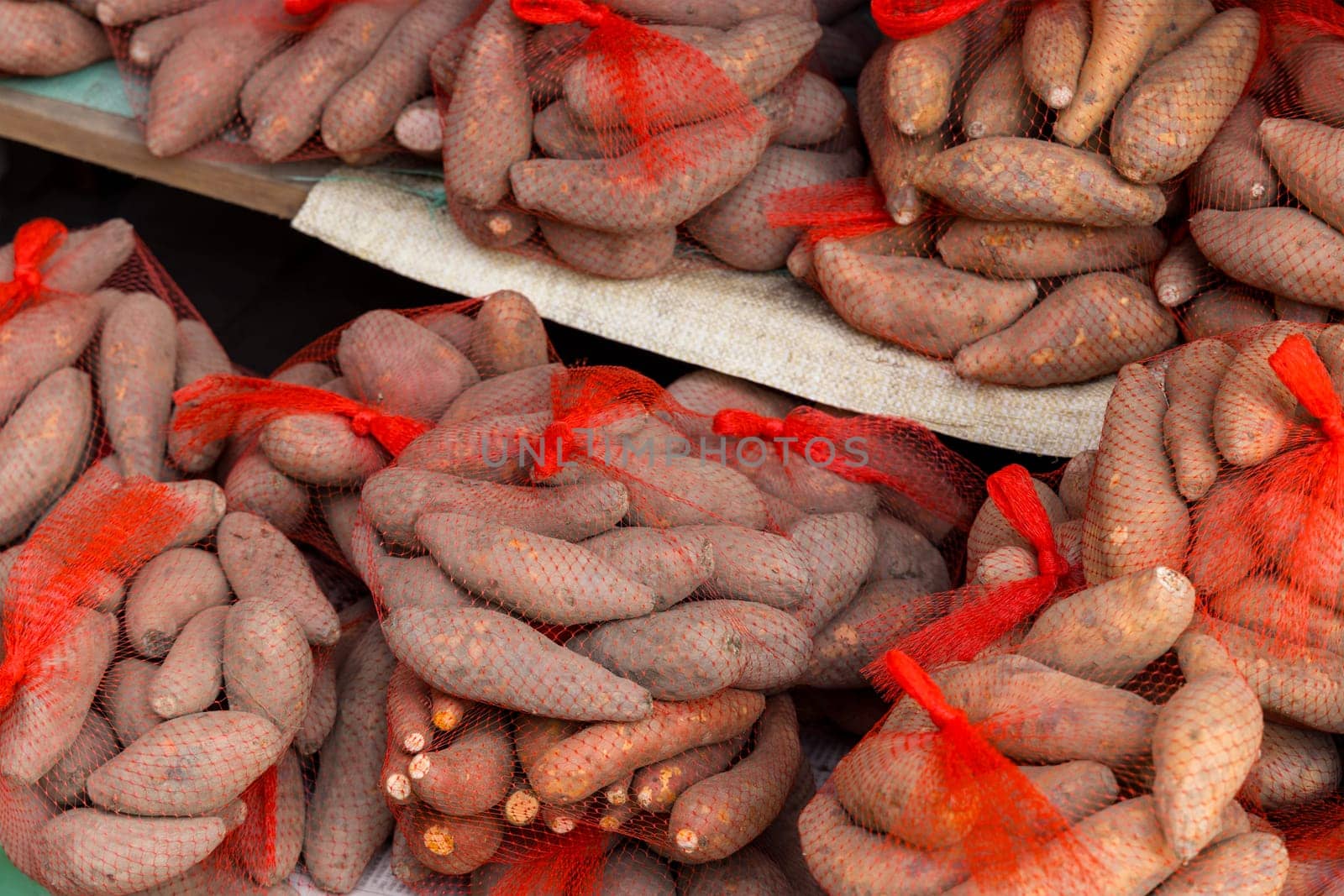 Stack of sweet potato sell in the market