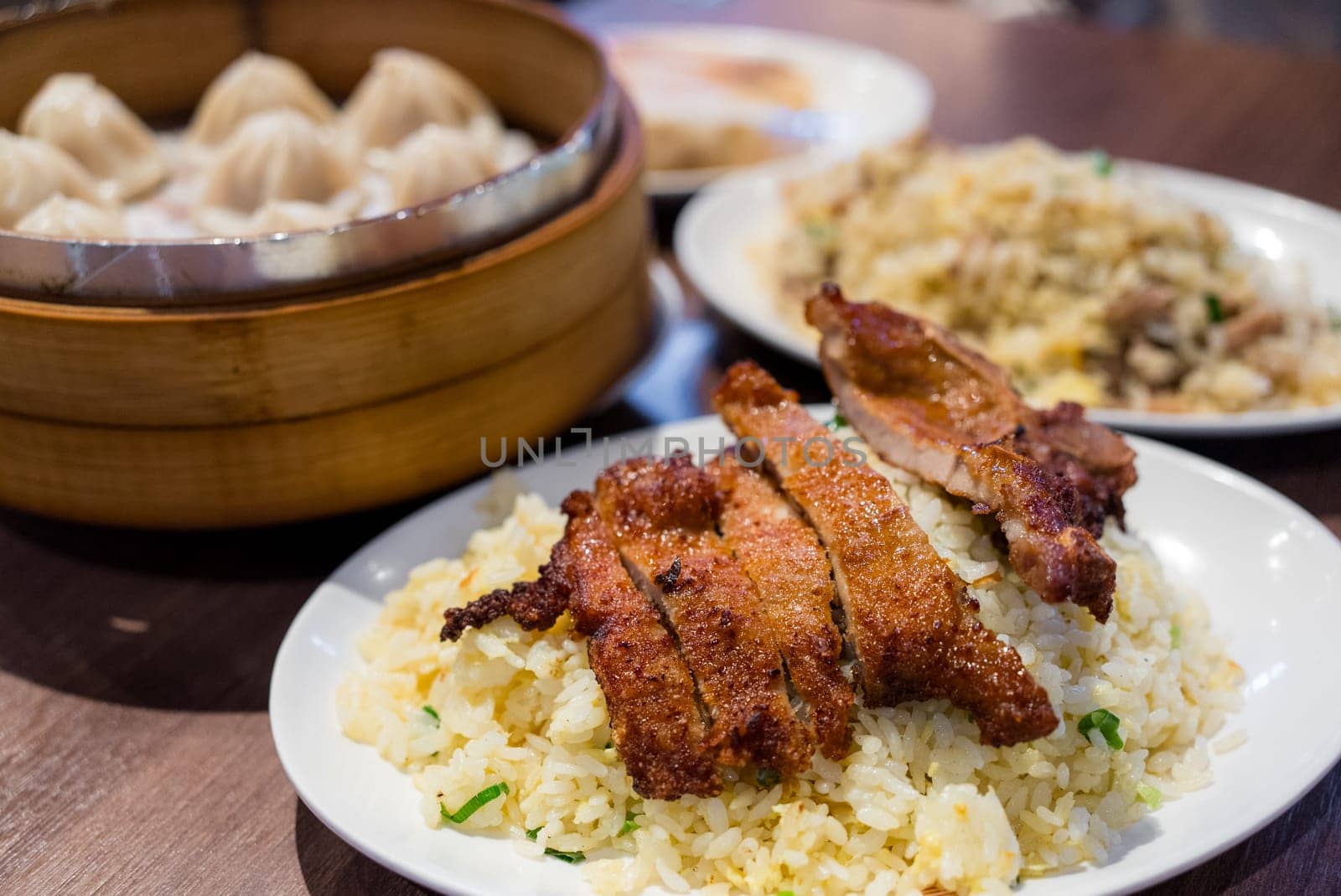 Fried pork chop with fried rice in restaurant
