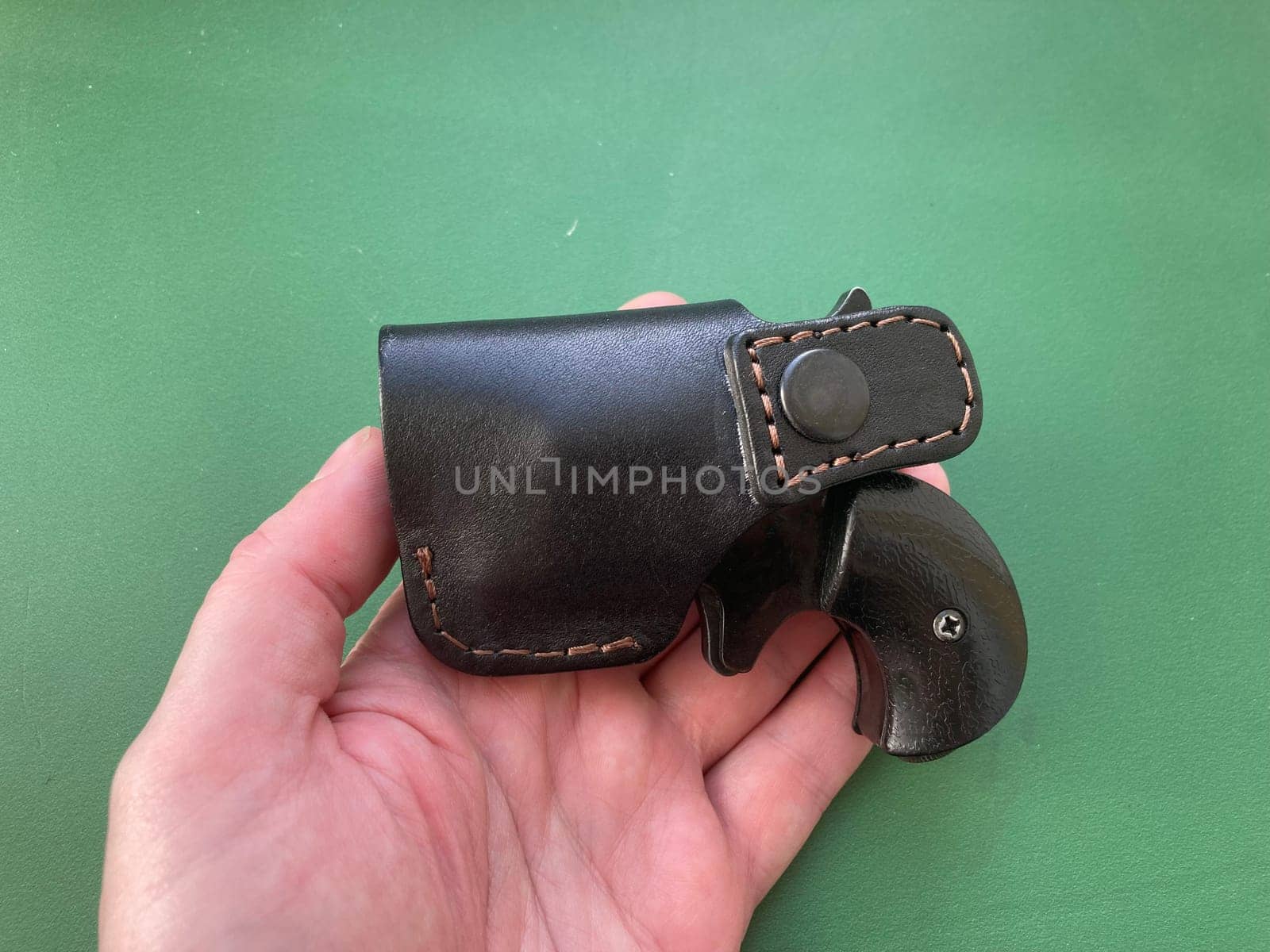 Revolver with holster for concealed carry of the weapons